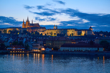 Prague Castle and Vltava river at dusk