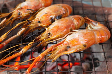 Grilled shrimp using charcoal stove,seafood concept.