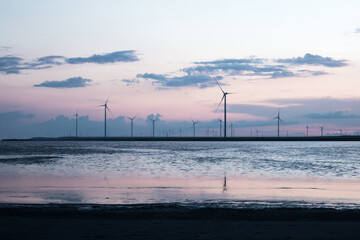 Scenery. Wind farms near a salt lake.