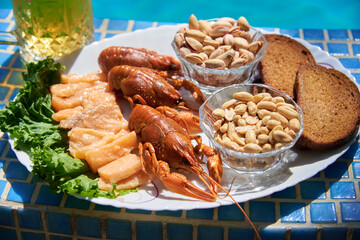 boiled crayfish, chopped smoked fish, nuts, crackers. Beer appetizer