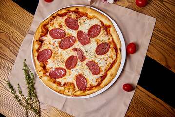 Italian cuisine, pizza with cheese and pepperoni