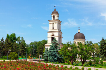 Cathedral Park in central Chisinau . Bell tower and cathedral in Chisinau Moldova . Ornamental garden with roses in the city park