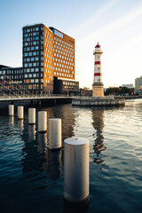 View over harbour and the old lighthouse from 1878 in Malmo, Sweden.