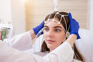 Patient brain testing using encephalography at medical center