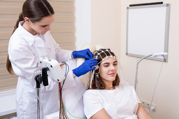 Patient brain testing using encephalography at medical center
