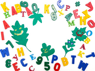 Colorful of randomly placed letters  and numbers with funny leaves from paper, place for text