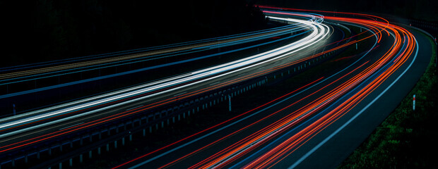 lights of moving cars at night. long exposure