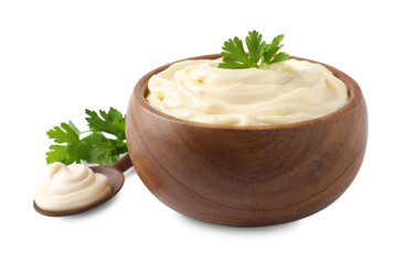 Spoon and bowl of delicious mayonnaise with parsley on white background