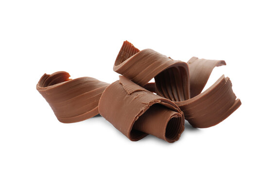 Yummy chocolate curls for decor on white background