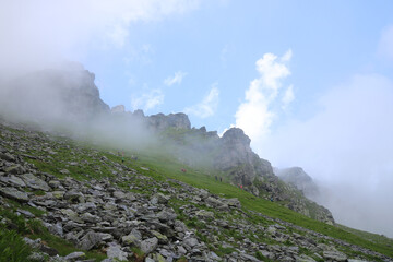 Morning fog lifting in the Pizol region, Switzerland.