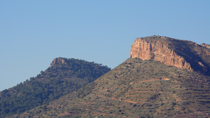 Fototapeta na wymiar Montañas llamadas La Redona y El Xocainet, cerca del pueblo de Gilet, en la provincia de Valencia. Comunidad Valenciana. España. Europa