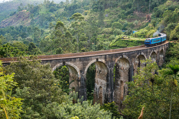 Fototapeta na wymiar Train on the Nine Arch Bridge. Ella, Sri Lanka.