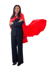 superhero and leader concept-full length portrait of cheerful asian businesswoman with red hero cape standing with folded arms, isolated on white background