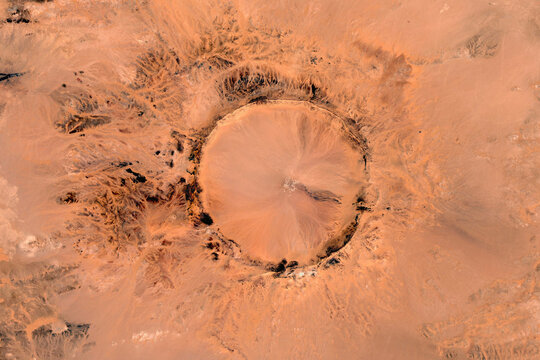 Tenoumer impact crater looking down aerial view from above, bird’s eye view Tenoumer Crater, Mauritania