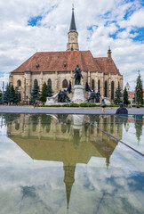 Equestrian monument of Matthias Corvinus and St Michael church in Cluj Napoca city, Romania