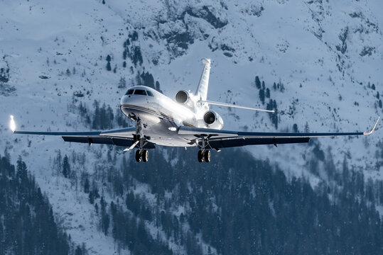 Luxury Private Jet Approaching The Engadin Valley In The Swiss Alps