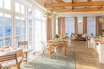 Fototapeta premium modern expensive luxurious open-plan apartment. Rich Scandinavian-style interior with wooden beams on the ceiling in pastel colors