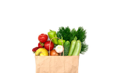 Healthy food in a shopping bag, fruits in a paper bag on a white isolated background. Vegetarian food delivery. Concept for grocery shopping, home delivery of groceries, top view, copy space. Flat lay
