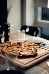 homemade pizza on a wooden table