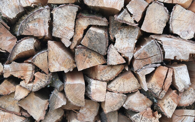 Wood piles of firewood, Background from dry chopped logs in a heap - Image