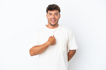 Young caucasian handsome man isolated on white background with surprise facial expression