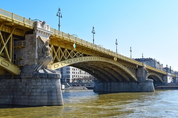 Margaret Bridge or Margit híd is a three-way bridge in Budapest, Hungary, connecting Buda and Pest across the Danube and linking Margaret Island.