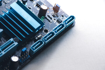 SATA connector ports and component on the computer motherboard and white color background