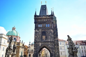Fototapeta premium Charles Bridge is a historic bridge Cross the Vltava River in Prague, Czech Republic. This bridge was built instead of the Jude Bridge that had been damaged by the flood.