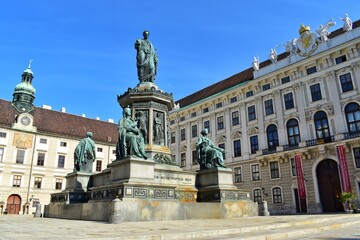 Fototapeta na wymiar Beautiful view of Kaiser Franz I Monument in the courtyard of Hofburg Imperial palace, Vienna, Austria.