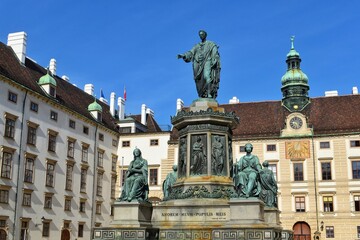 Fototapeta na wymiar Beautiful view of Kaiser Franz I Monument in the courtyard of Hofburg Imperial palace, Vienna, Austria.