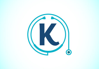 Initial K monogram alphabet with doctor stethoscope. Vector stethoscope logo or icon. Logo for medical and pharmaceutical business and company identity