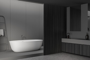 Fototapeta na wymiar Corner of dark grey bathroom space with wood details and white tub
