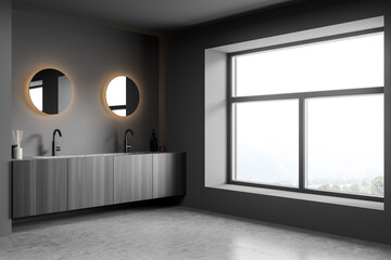 Dark bathroom interior with mirror and double sink