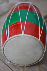 The green and red music drum.