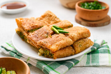 Martabak Telor or Martabak Telur. Savory pan-fried pastry stuffed with egg, meat and spices.