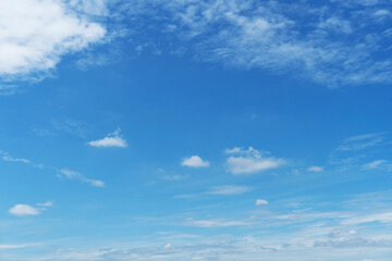 Obraz premium Beautiful clouds during spring time in a Sunny day. Blue sky and white fluffy clouds