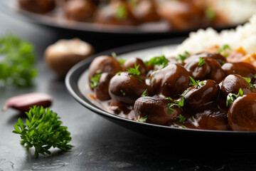 Mushrooms in Balsamic Soy rich sauce with rice. healthy vegan food.