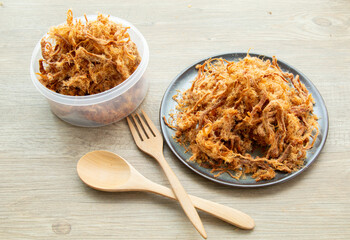 Dried shredded pork on ceramic bowl wooden background, Asian sweet snacks, tasty appetizer for meal natural light, process food product from pork