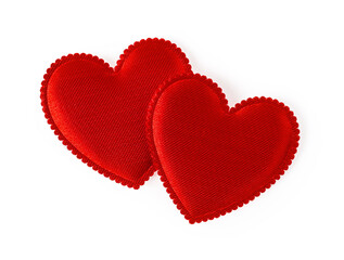 Two red valentine hearts isolated on white background. Pair of vintage silk valentine hearts. Iove and togetherness concept. Design element for holiday, greeting card, postcard and banner.
