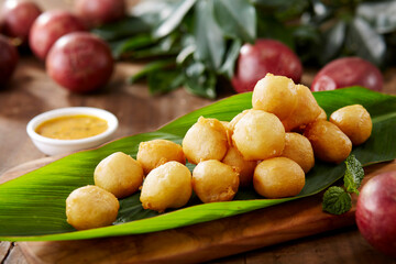Delicious and refreshing Chinese summer dishes, croquettes with passion fruit sauce