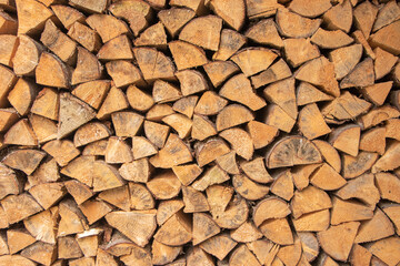 wall firewood , Background of dry chopped firewood logs in a pile