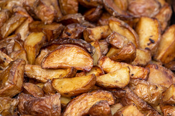 Fried Potato wedges. Fast food background