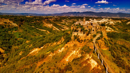 Approaching medieval town of Civita di Bagnoregio from a drone, Italy.