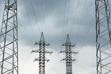 high-voltage power line with metal poles and cables