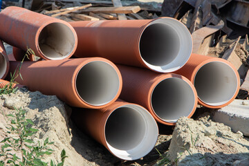 Group of black big pipelines at the sity
