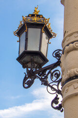Fototapeta na wymiar Old street light lantern on bilding
