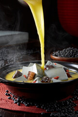 Delicious Chinese food, steamed black tofu with minced meat and bean paste