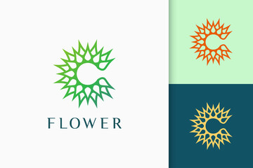 Flower or nature logo in initials or letter c shape for spa and yoga