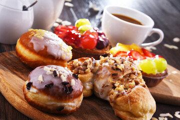 Composition with confectionery products and cup of coffee