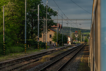 Blue czech trains near in Plzen town area in sunrise morning time